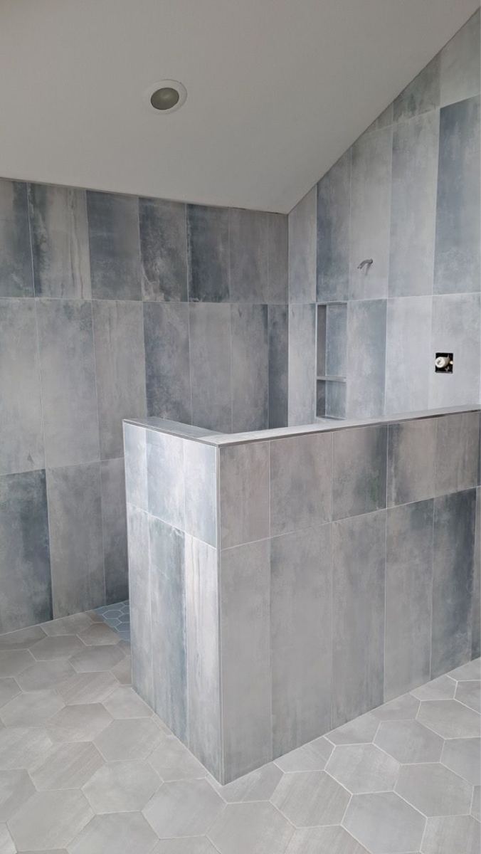 Gray large-format shower tile