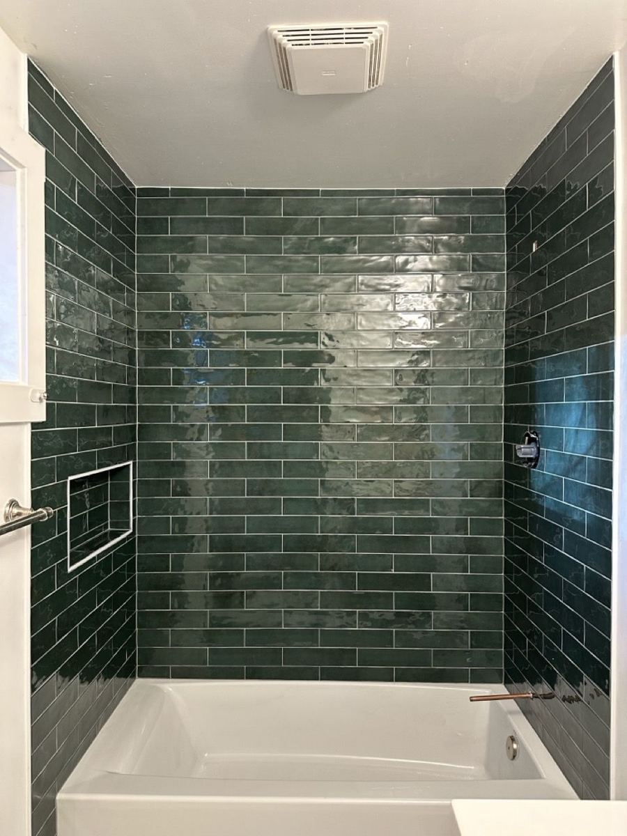 Green subway tile tub surround