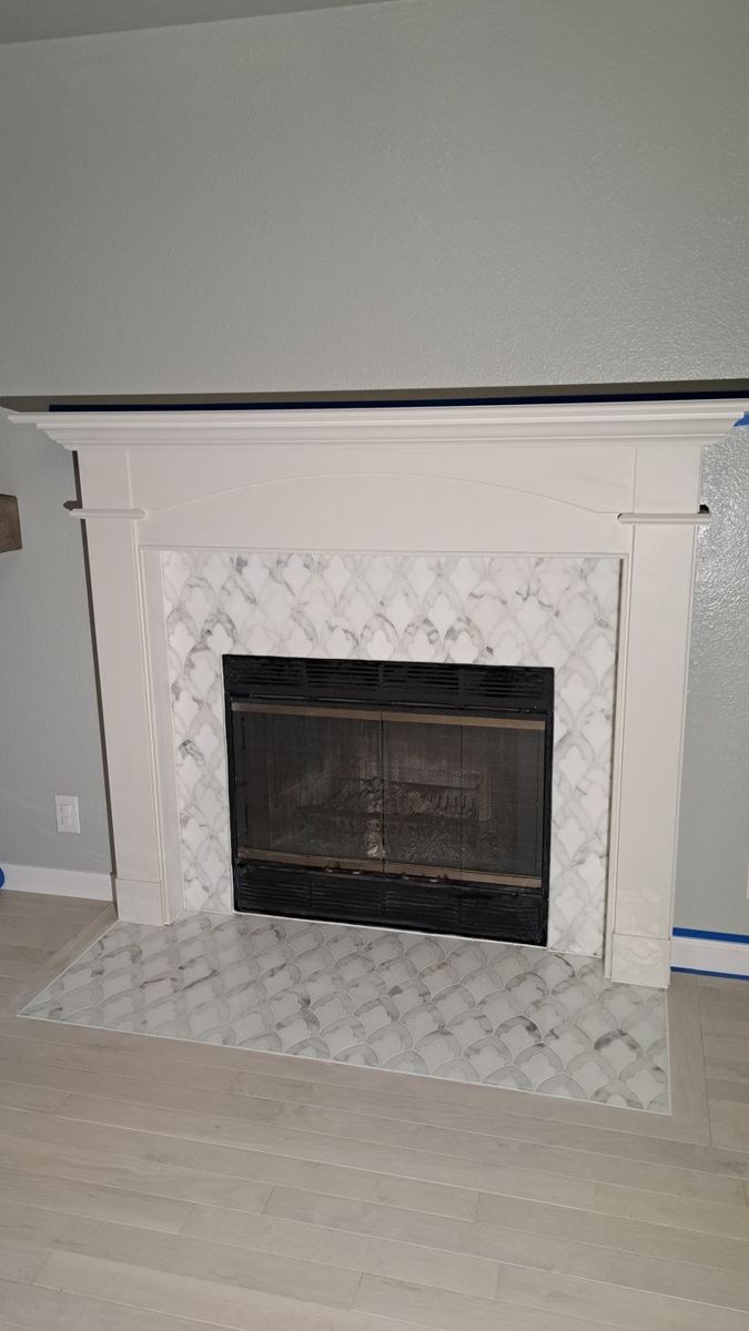 Patterned tile fireplace surround