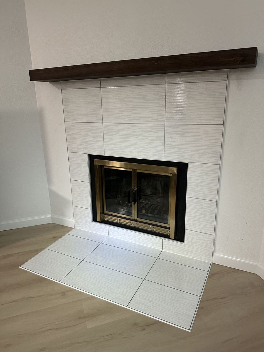 White tile fireplace surround